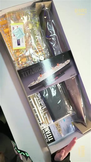 1.5K views | Kobey and Kawa crack open a real classic: The Academy 1/400 RMS Titanic model kit  This one’s got serious old-school charm. Wooden deck textures, gold display plaque, and tiny lifeboats all packed into a kit that won Model of the Year back in 1989! Simple build, but it looks way too good to stay boxed up. Watch the unboxing now: https://youtu.be/FDGQru2rxr0 #titanic #modelkit #shipmodel #academyhobby #scalemodel | Hearns Hobbies | Facebook