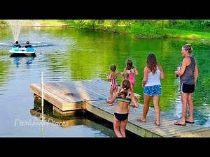 Peaceful 15 acre RV park for sale with 29 FHU RV sites, 9 deluxe cabins, & a large owner’s home