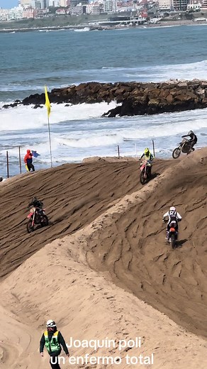 Motocross Racing Action on a Sandy Beach Track