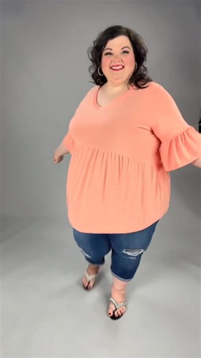 This coral babydoll tunic was made to move with your curves and brighten your whole mood 🍑✨ Soft, breezy, and easy to dress up or down! Top- https://www.buycurvy.com/products/100-sss-feeling-peachy-peach?_pos=1&_sid=840ad8ece&_ss=r #WearTheVibe #PlusSizeOOTD #CurvyAndConfident #SpringSummerVibes #PlusSizeTunics #BoutiqueFashion #EveryBodyBeautiful #plussizefashion #CurvyAndChic #StyleForEveryBody #CurvyAndBlooming #CoralCutie #BabydollVibes #CurvyAndCute #BoutiqueStyle #CurveApproved #PlusSizeT