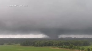 Tornadoes possible in the South, while smoke hovers over Midwest