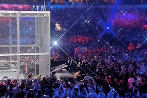WrestleMania 32: Watch Shane McMahon jump from the top of a cage through a table