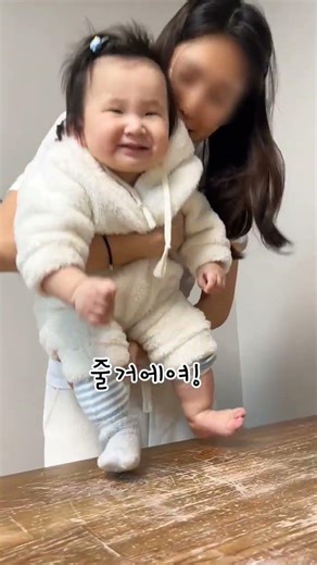 Making handprints, footprints, and ceramic plates to commemorate a baby's first birthday. A retur...