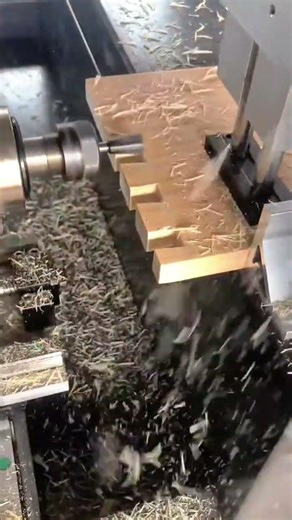 cutting precise dovetail joints in wooden board using a professional milling machine for carpentry