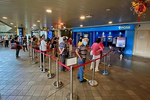 Long queues at banks, pop-up ATMs for new Chinese New Year notes