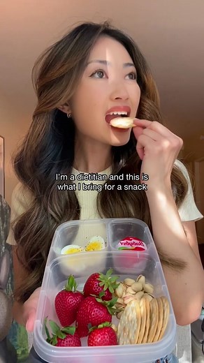 Preparing snacks for a busy day can be a great way to remind yourself to eat and nourish your body 🤗As always, pair protein (e.g. cheese, eggs, nuts) with some fiber-rich carbs (e.g. fruits, whole grains, veggies) so you can feel satiated and full! #dietitian #healthysnacks #asmr