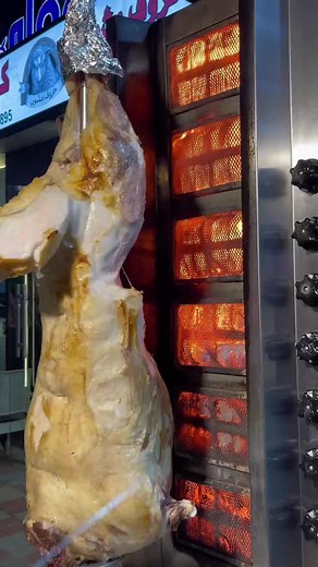 Vertical Rotisserie Cooking: Whole Roasted Lamb or Pig