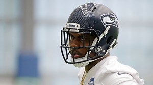 Video shows NFL player fighting police officer after being tased