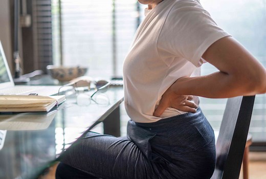 Lower back pain is rarely a sign of cancer—but it can be