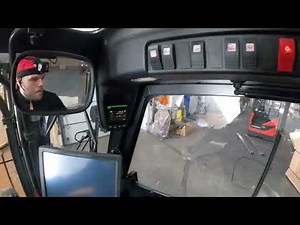 Unloading container and 1 stack of plywoods falls inside the container