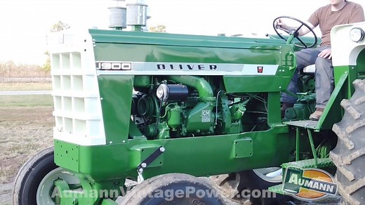 This restored Oliver 1900 Checkerboard Diesel brought $10,500 on an October online only auction. The Oliver 1900 was built from 1960 to 1964 at the factory in Charles City, Iowa. Its powered by a General Motors, 212 cubic-inch, 4-cylinder diesel engine that can do 88 horsepower on the drawbar and 100 horsepower on the PTO. When you bought this tractor new in the 1960s it would have cost you $6,000 US dollars or about $50,000 US dollars today. #olivertractor #olivermachinerycompany #minneapolismo