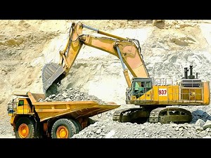 Komatsu PC1250 Loads BelAZ Dump Truck | Iron Ore Mining Action