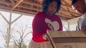 Woman Learning Farm Life Meets A Rooster For The First Time