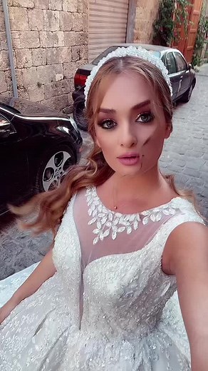 Elegant Wedding Dress in Charming Cobblestone Street