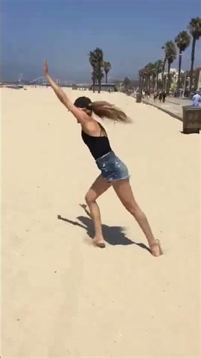 cartwheels in the sand w a velociraptor#BeachVibes... #Shorts #tatycake