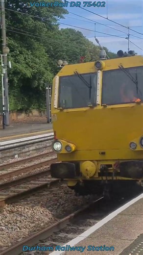 VolkerRail DR 75402 speeds past Durham Railway Station
