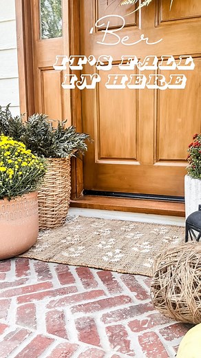 ‘Ber…my favorite months of the year end in ‘ber 🤎🧡 And I’ve been itching to get this front porch decorated since I laid each one of these bricks by hand with @oldmillbp gorgeous thin bricks and created this wood door with the faux wood kit! Now weather, please change. Leaves, please fall. Thank you. | Rachel Kemper