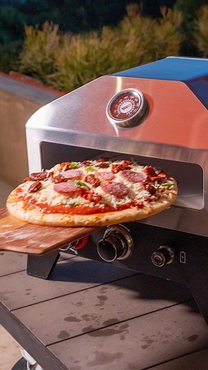 Celebrate #NationalPizzaDay everyday with the new Nexgrill 12-inch Tabletop Propane Gas Outdoor Pizza Oven! Coming soon to backyards and patios everywhere! #Nexgrill #PizzaOven #NexgrillPizza #EveryonesInvited #PizzaDay | Nexgrill
