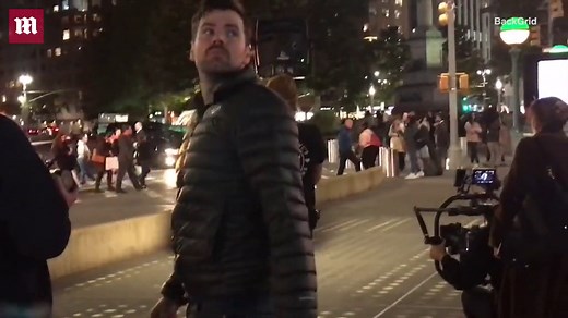 Stella Maxwell dons angel wings for photoshoot at Times Square