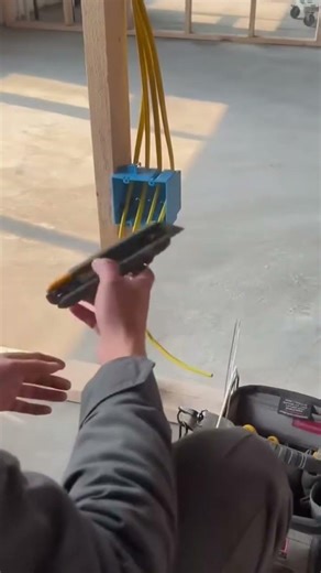 How professionals assemble a power outlet in a building