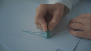 Hands drawing straight lines and a triangle Free Stock Video Footage