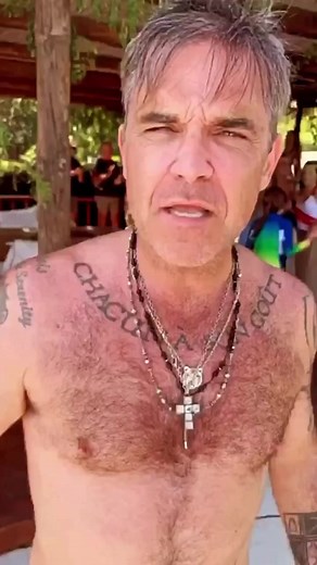 422K views · 3.1K reactions | A little throwback to this time last year Robbie Williams on his hols… and who doesn’t love a bit of #ABBA  | Robbie Williams Fanfest | Facebook