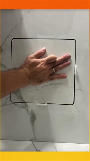 Installing a ceramic door panel for the lower kitchen cabinet #kitchenset #construction #diy #shorts