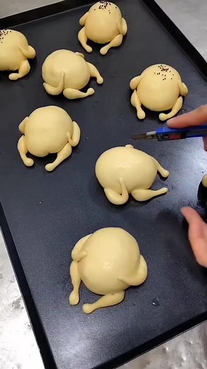 Cryspy Chicken Bread 🥰 dough preparation in the mixer bowl bread flour 400g sugar 20g salt 6g instant dry yeast 6g stir well water 240ml knead the dough for 4min butter 30g knead the dough for 7min cover the dough rest the dough for 20min separate the dough into 80g each piece for small pieces 6g dough make balls cover the dough rest the dough for 10min make the bread roll the dough boiled chicken meat piece of gouda cheese or use grated cheese your choice make the chicken legs make the chicken