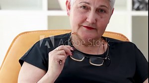 older woman with glasses to see