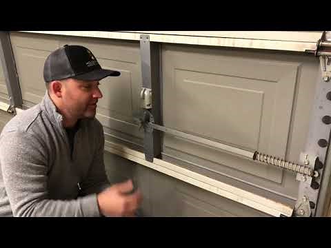 How to disable the manual latch on an automatic garage door
