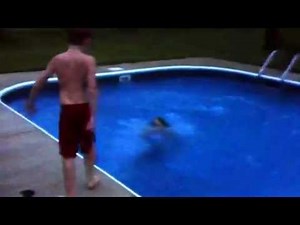 Girl gets thrown in swimming pool