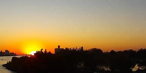 4.8K views · 95 reactions | 廒 Tonight's brilliant sunset over the Detroit River looks stellar from Belle Isle, but we're guessing that the vantage point from the pilot of the paramotor (powered glider) soaring over the city looks equally amazing! Note this is a timelapse, so the pilot isn't moving quite *that* fast.  Video courtesy of BoatNerd.com | Great Lakes Weather & Climate | Facebook