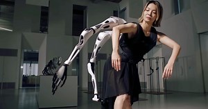 wearable robot arms that move like spider legs prepare human interaction with cyborgs