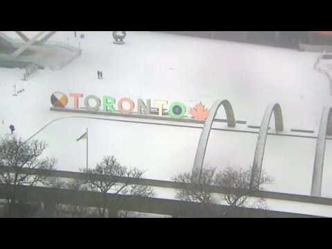 Views of Toronto as winter storm thrashes city with snow, rain and wind