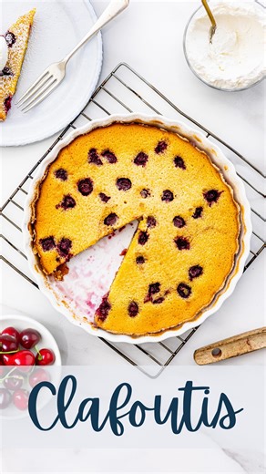 ⚜️ The classic dish in our latest “Guess the Classic” challenge is: Clafoutis aux Cerises or Cherry Clafoutis! Clafoutis is a traditional dessert from the Limousin region of central France. It consists of unpitted black cherries baked in a thick, crêpe-like batter made from eggs, milk, flour and sugar. The golden baked custard is often served warm with a dusting of icing sugar. The name “clafoutis” is believed to derive from the word clafir, meaning “to fill” – a reference to the batter poured o