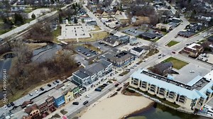flyover of a small beach town in the midwest (Pewaukee, WI)