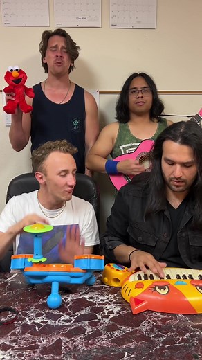 Elmo Rocks Out in Tears Don't Fall Music Video