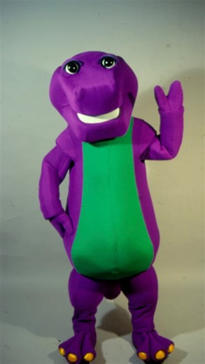 Tee-Riffic Tributes on Instagram: "A video has recently surfaced of a September 91’ birthday party, featuring the first licensed Barney birthday/event performance costume. The 20 piece spandex costume was developed by long time Barney suit designer Irene Corey, modeled after the original 1988 Backyard Gang design 💜 Performing inside the costume is Carey Stinson - longtime Barney body performer - as this was his first gig as the friendly purple pal! The company who secured the first Barney perfo
