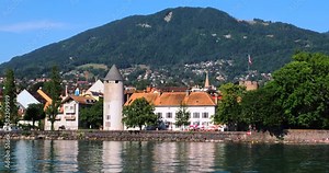 Vevey, Switzerland - July 14, 2022: View from a tourist boat on Lake Geneva passing Vevey near Lausanne