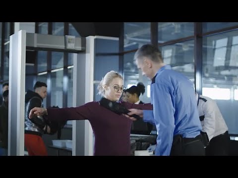Airport Security Guard Checking Passenger Stock Video