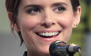 Kate Mara Smolders in Tiny Satin Mini Dress, Open-Toe Stilettos, “Ooh LA LA”