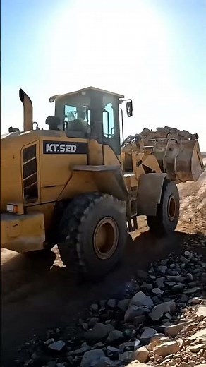 Massive Wheel Loader at Work: Moving Tons of Rock! 🚧 Quarry Action