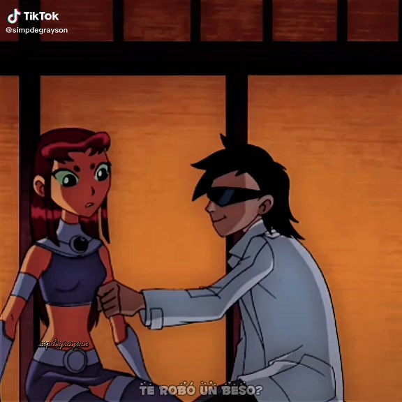 Starfire y Robin Beso: Momento Romántico en Teen Titans