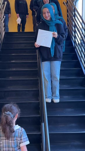 Graduates Pass Down Caps to Kindergarten — Full-Circle Moment