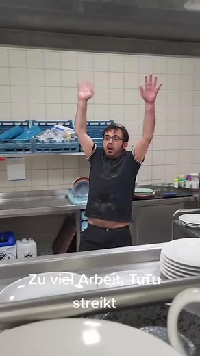 Man's Kitchen Exhaustion: A Work Shift Break