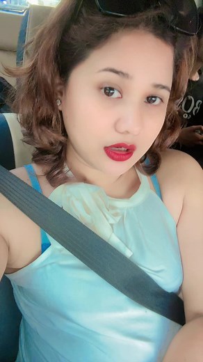 Everyday Car Ride Moments with a Light Blue Top