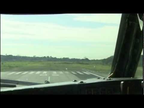Loaded 707 lifts off just before end of runway at Manaus!