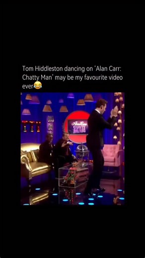 Real History on Instagram: "Tom Hiddleston dancing on Alan Carr: Chatty Man is one of those unexpectedly perfect TV moments that never gets old. What makes it so great isn’t the dancing itself, but how completely he commits—no self-consciousness, no movie-star cool, just pure, joyful chaos. Seeing someone known for playing intense, brooding characters let loose like that makes him instantly more likable and human. It’s the kind of clip that reminds you why the internet loves him so much: charmin