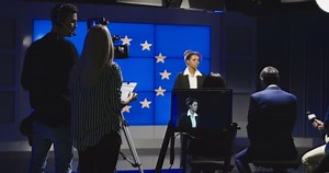 Female News Anchor Reading the News