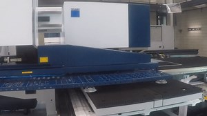 The SheetMaster swoops in to remove finished parts on our TruMatic 7000. | TRUMPF Inc.